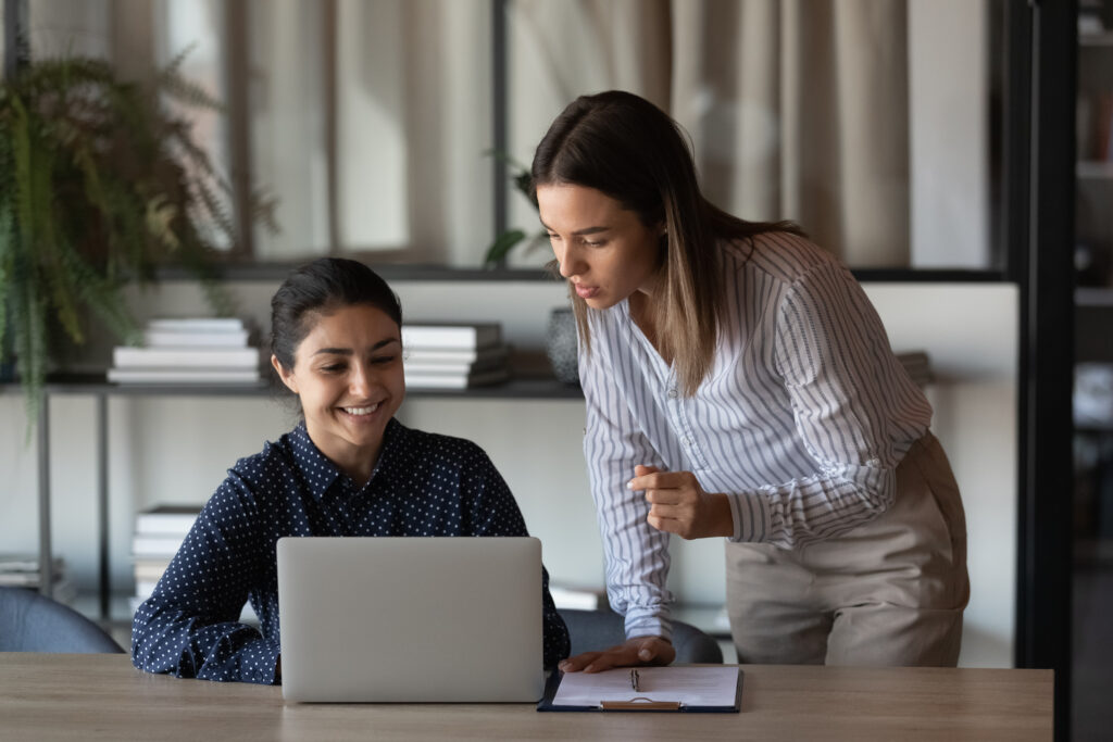 sales intern talking to a colleague