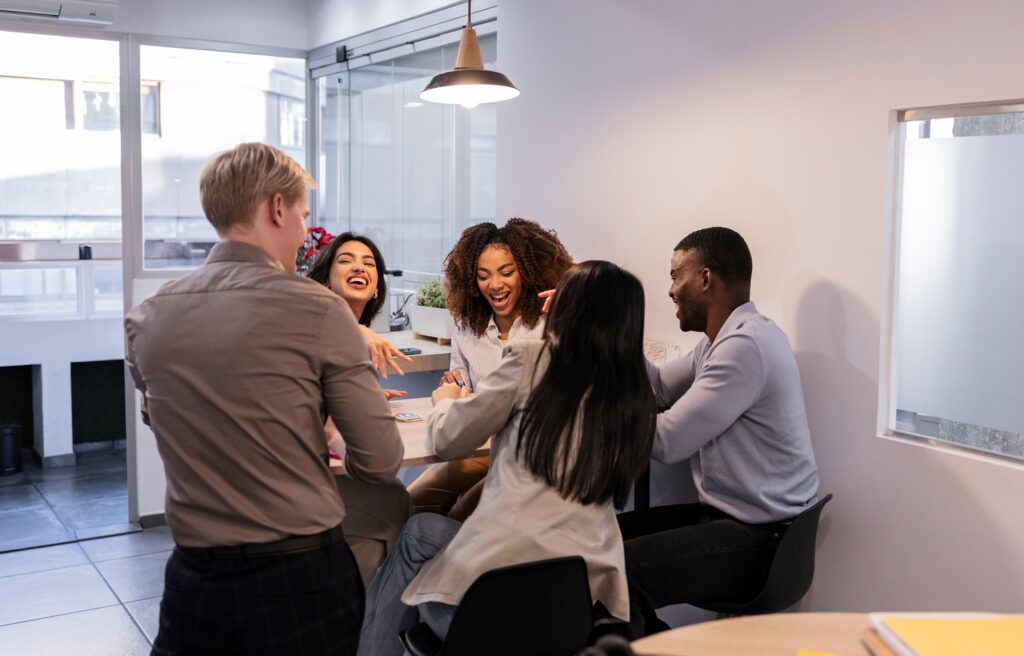 A diverse group of professionals demonstrating a positive team culture