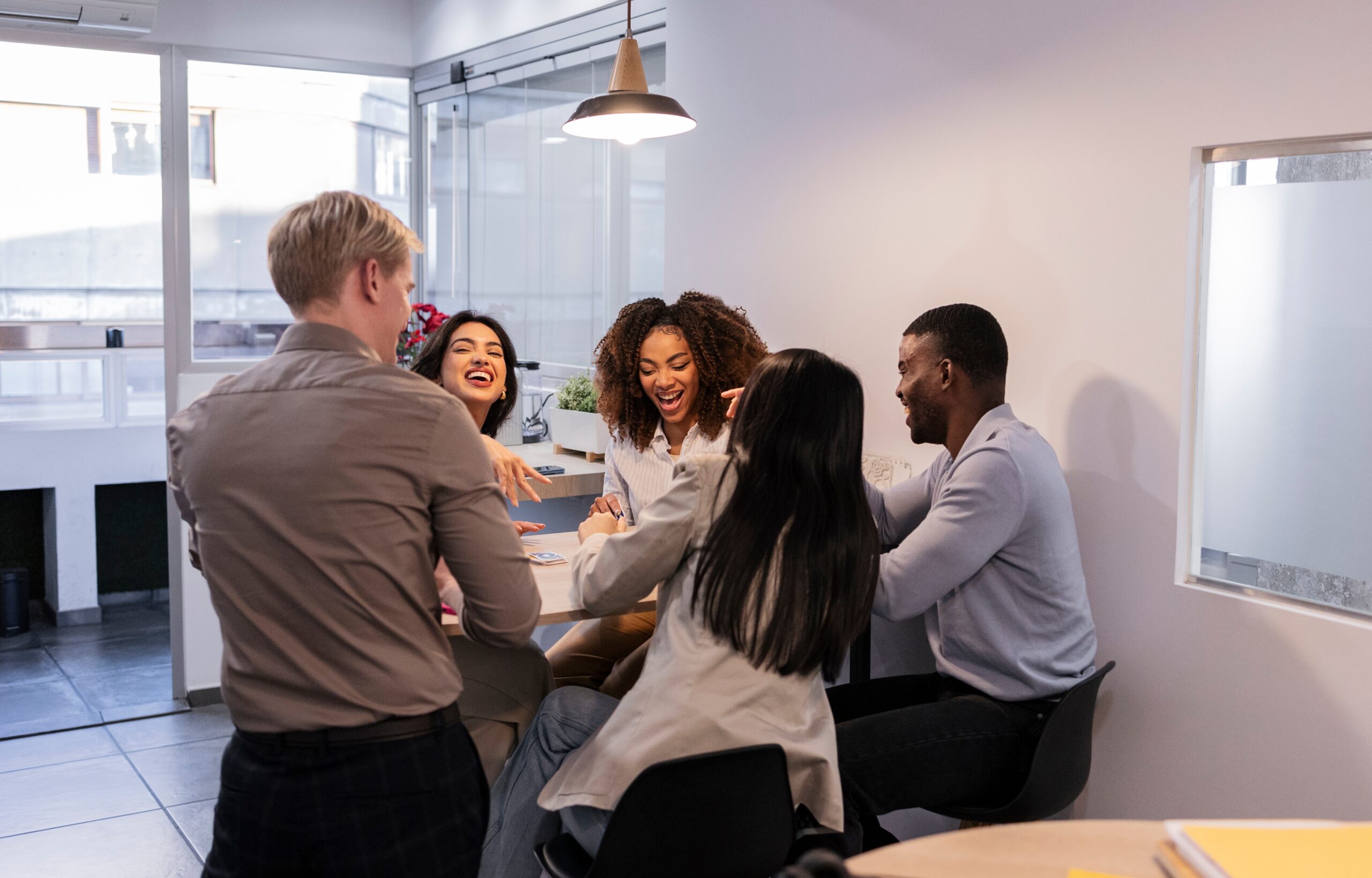 A diverse group of professionals demonstrating a positive team culture